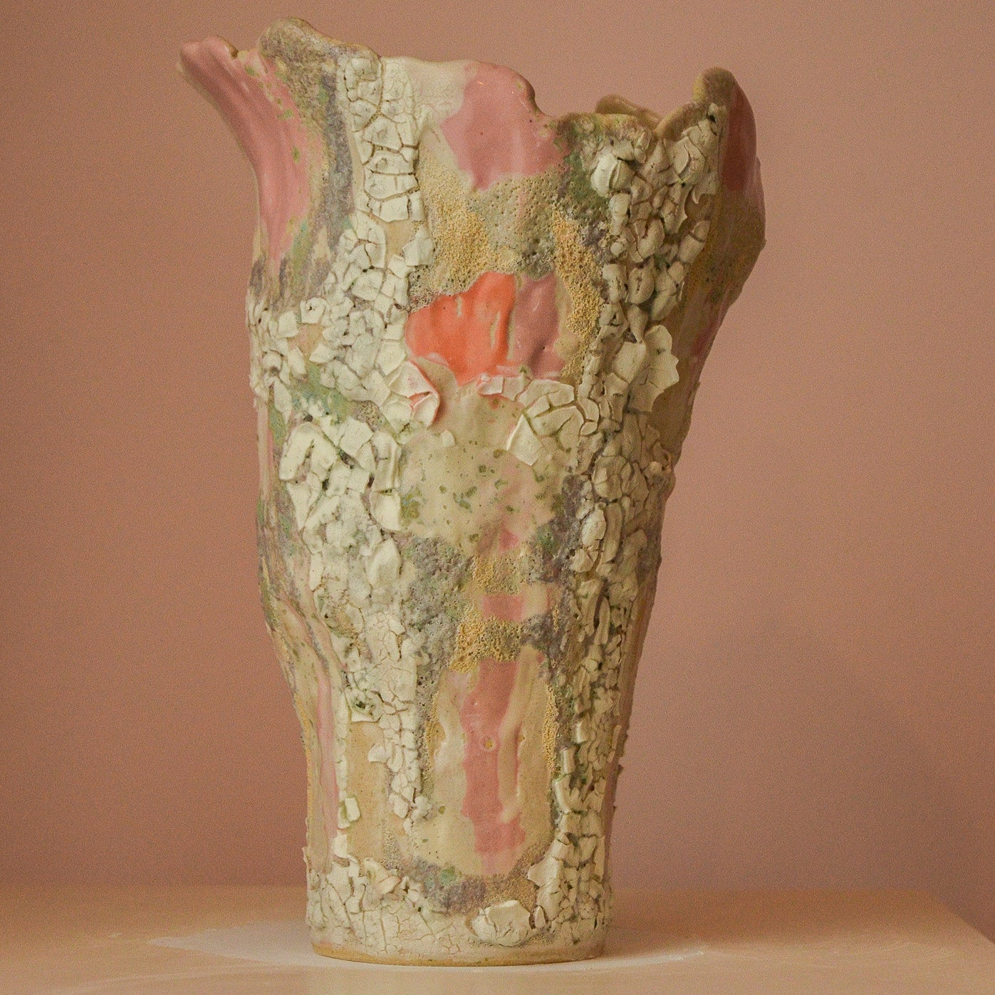 Decorative ceramic vase with textured surface  