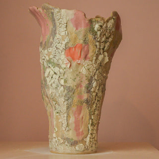 Decorative ceramic vase with textured surface  