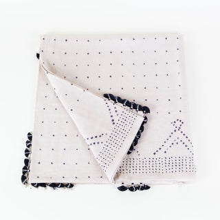 Injiri Throw Blanket | Dots + Tassels